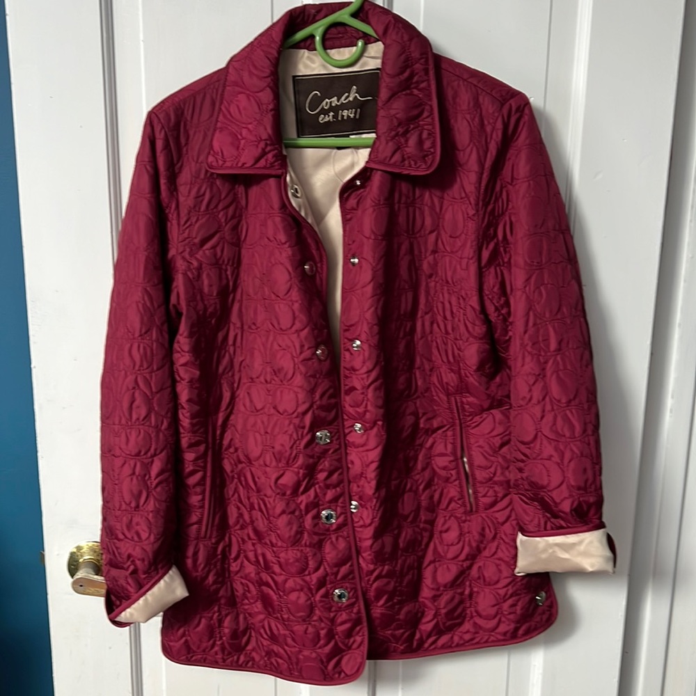 Coach magenta/raspberry button rain jacket size s, barely used in new condition.